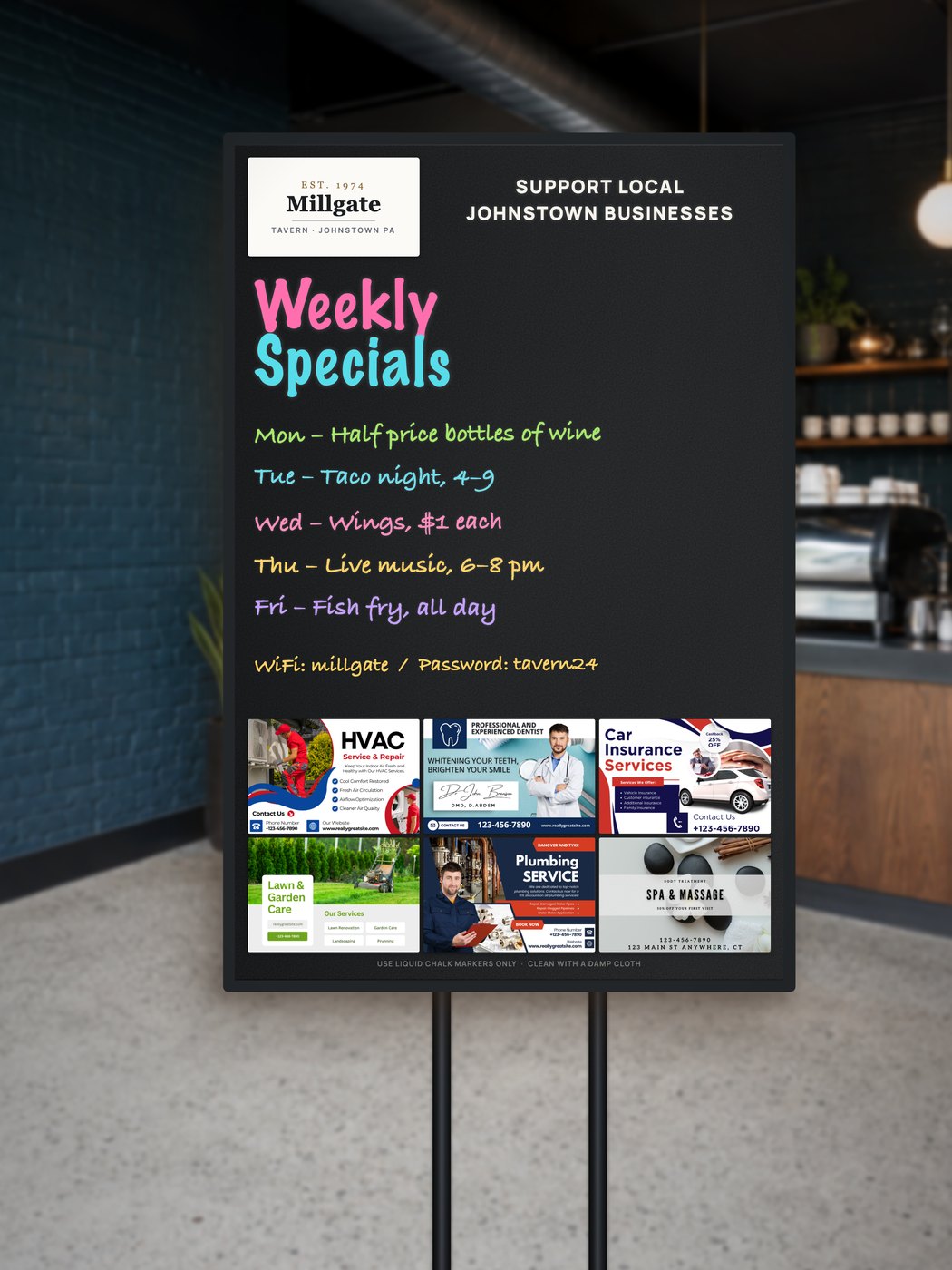 A Community Board on its stand inside a tavern, showing the host logo, handwritten weekly specials and six business placements